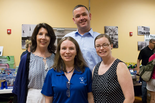 Left to Right: Jean Butler, Toy Industry Foundation Executive Director; Susan Schroeter, National CASA; Chris Moore, Owner Fast Lanes Entertainment