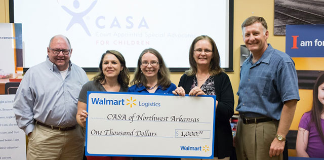 Left to Right: Larry Perkin, CASA Board Member; Crystal Vickmark, CASA Executive Director; Susan Schroeter, National CASA; Becky Anderson, VP HR Operations Walmart; Chris Sultemeier, EVP Walmart Logistic